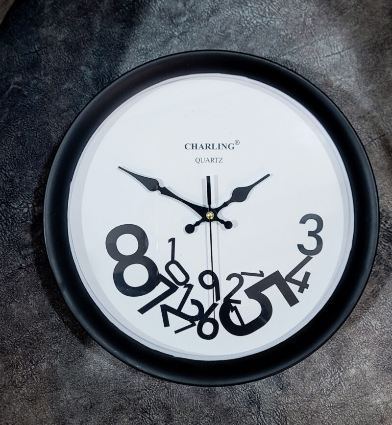 Creative Falling Numbers Wall Clock – Modern Artistic Design (Black & White) - Image 2
